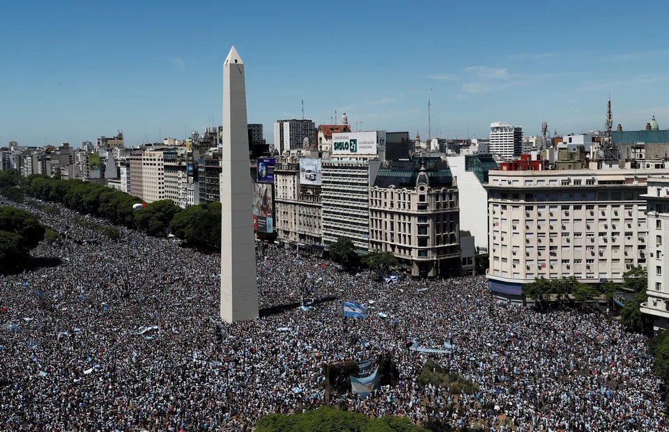 Argentinians were out in force around the Obelisco de Buenos Aires, Dec 20, celebrating Argentina's World Cup triumph. 