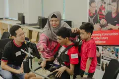 The collaboration between DBS Foundation and SG Enable has allowed people with disabilities, such as Muhammad Sayfullah (centre), to pick up financial concepts.