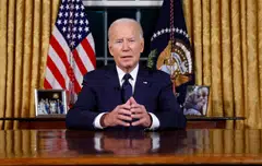 Biden’s first TV ad of the year warns of an “extremist” threat to democracy, featuring images of the Capitol attack set to dramatic music.
