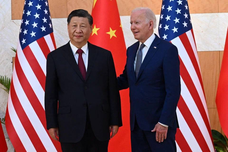 Chinese President Xi Jinping (left) and US President Joe Biden meeting on the sidelines of the G20 summit at Bali in November 2022 - this is the last time the two leaders have met in person.