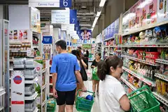 Disinflation may pause in the first half of the year amid higher GST and utilities costs, as well as wage cost pressures, say economists.