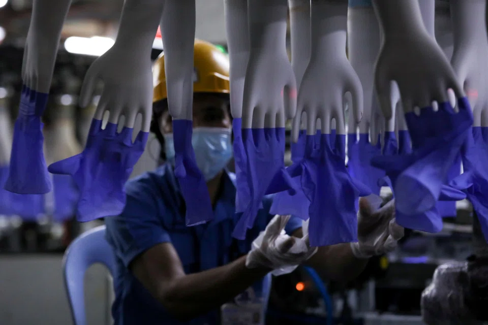 Top Glove says its softer financial performance comes as the industry weathers an adjustment period with oversupply and excess stockpiling by customers during the pandemic. 