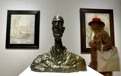 Works by Swiss artist Alberto Giacometti, including "Buste de Diego" (1961, above) , are among those on display at gallery owner Kamel Mennour’s stand in Paris.
