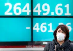 In early Asian trade on Wednesday, Hong Kong, Singapore, Sydney, Seoul, Taipei, Jakarta and Manila all fell, while Tokyo and Shanghai were barely moved.