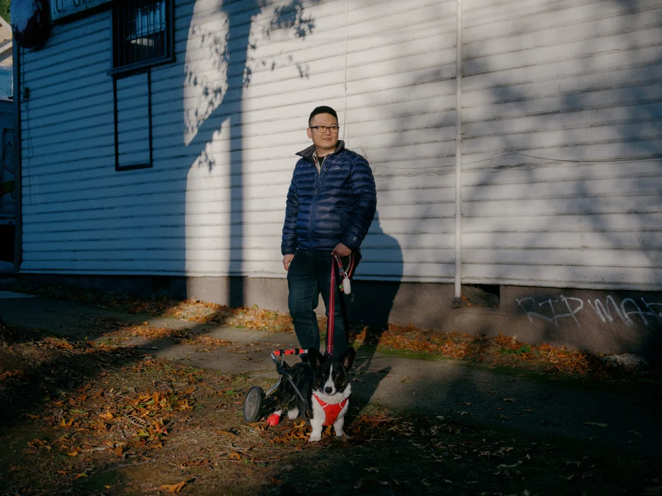 Hung Truong, who remembers feeling relieved after sharing online about his layoff from Lyft at the start of the pandemic, at his home in Seattle on Nov 8, 2022.  