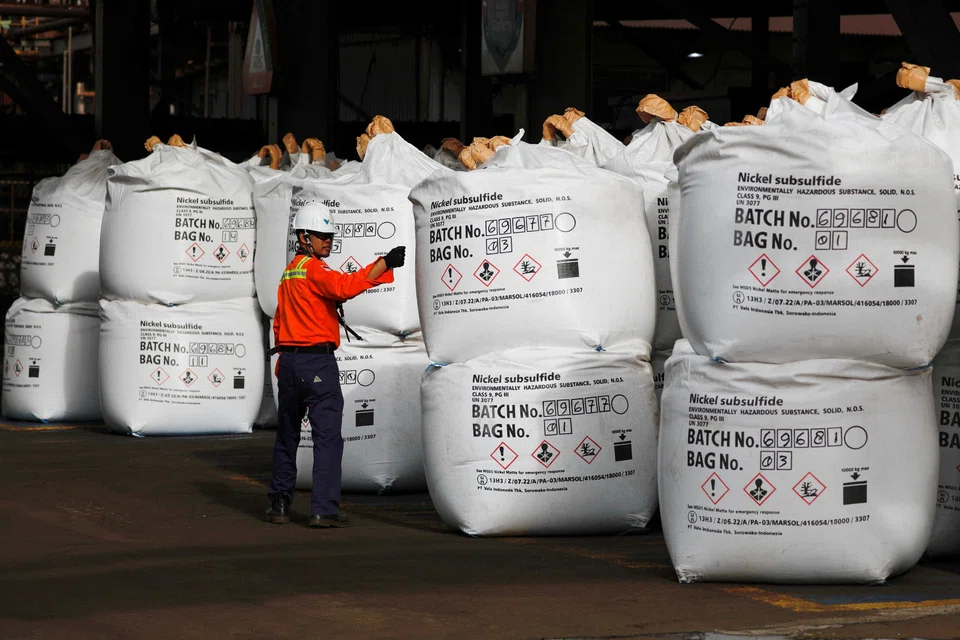 A worker walks beside nickel subsulfide at a nickel smelter of PT Vale Tbk in Sorowako, South Sulawesi province, Indonesia, March 30, 2023. REUTERS/Ajeng Dinar Ulfiana