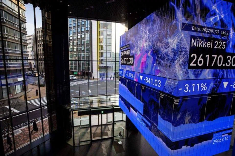 Asian shares clung on to small gains on Friday thanks to a solid Wall Street session, but were still set for their worst month in 2 years, as China growth fears and looming US rate hikes dragged on sentiment and sent the safe-haven dollar soaring. 