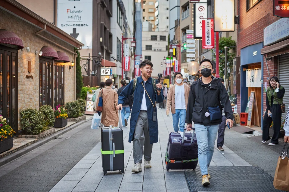 Japanese cosmetic maker Shiseido and South Korea's Hana Tour Service saw their shares climbing after China announced it would allow group tours to both countries.