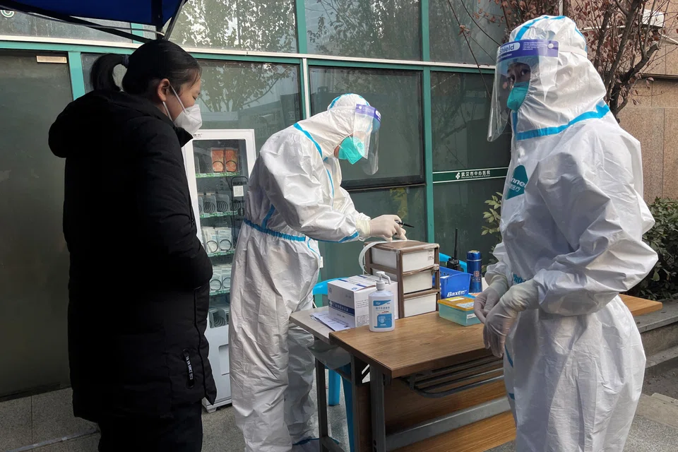 Several leading scientists and WHO advisers say it may be too early to declare the end of the Covid-19 pandemic emergency phase because of high levels of infections in China.