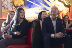US President Joe Biden listens to an opening speaker during a campaign event at El Portal restaurant in Phoenix, Arizona, March 19, 2024. Biden holds a widening lead over Donald Trump in the fundraising stakes, while Trump is burning through legal fees as he battles multiple criminal and civil cases.