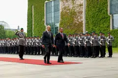 Li was given a full military honours welcome by Scholz on Tuesday.