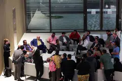 Representatives negotiate a draft deal during the United Nations Climate Change Conference in Dubai, United Arab Emirates, Dec 12, 2023.