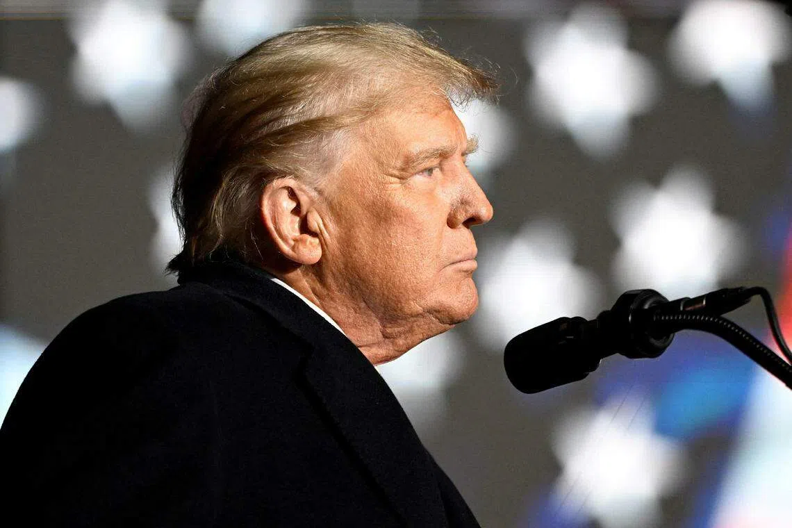 FILE PHOTO: Former U.S. President Donald Trump speaks at a rally to support Republican candidates ahead of midterm elections, in Dayton, Ohio, U.S. November 7, 2022.  REUTERS/Gaelen Morse/File Photo