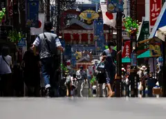 Japan braced for a possible power crunch on Monday as temperatures climbed across the country and the rainy season ended in the Tokyo area at its earliest point since 1951.