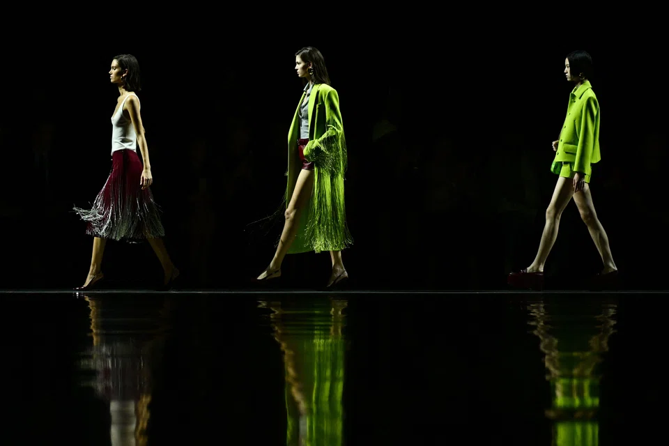 Models walk the runway of the Gucci fashion show during the Milan Fashion Week.