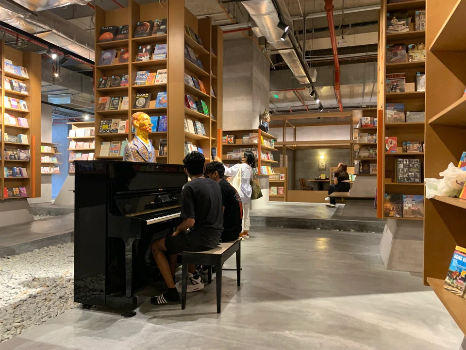 A piano placed in the centre of one of the BookXcess outlets, inviting music lovers to show their talents.
