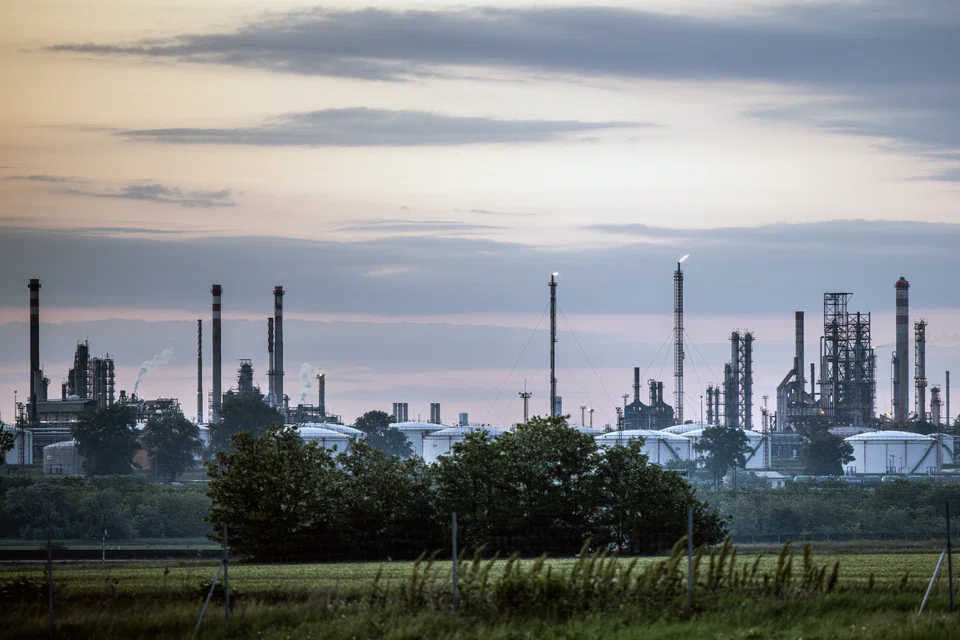 Oil prices settled slightly higher on Friday.