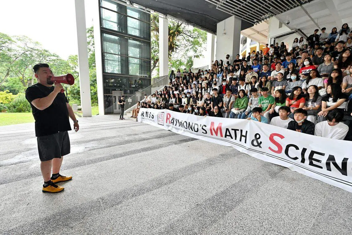 Teen students visiting an NUS open house. They were brought there by a tuition centre.