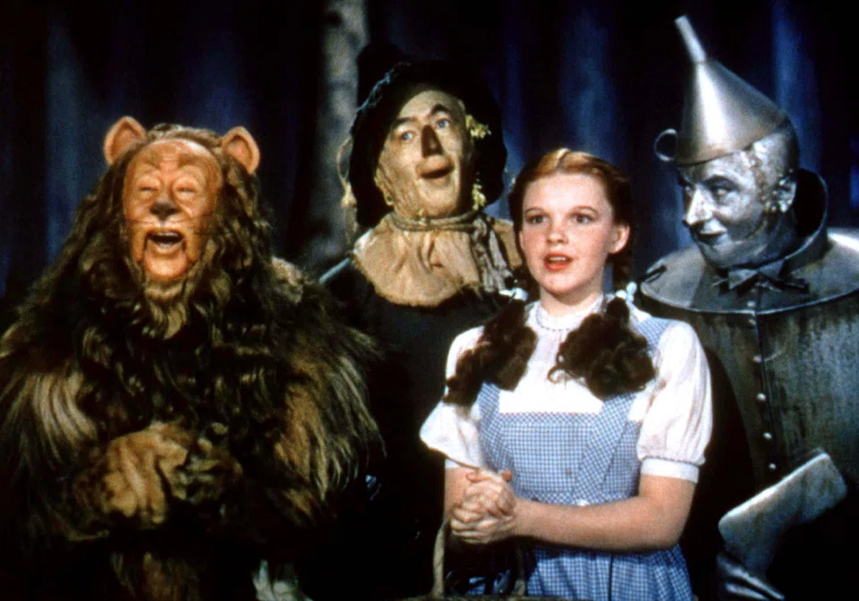 The sequined shoes are associated with the character Dorothy clicking them together and saying repeatedly, “there’s no place like home”. 