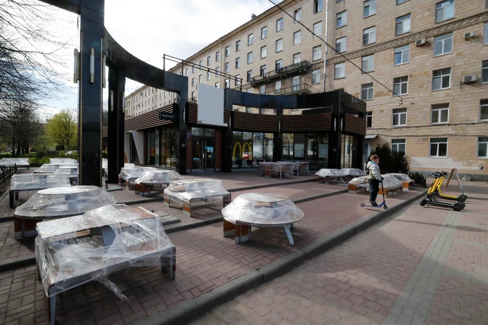 The outdoor tables of the closed McDonald's restaurant are wrapped up in St Petersburg in Russia. The US fast-food chain, along with numerous Western companies, shut down its trading in Russia as part of the economic sanctions in response to Russia's military operation against Ukraine.   