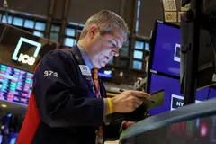 The Dow Jones Industrial Average fell 127.00 points, or 0.38 per cent, at the open to 33,699.69. 