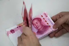 The central bank had also cut the reserve ratio for foreign exchange deposits for financial institutions for the second time this year on Monday to support the currency.