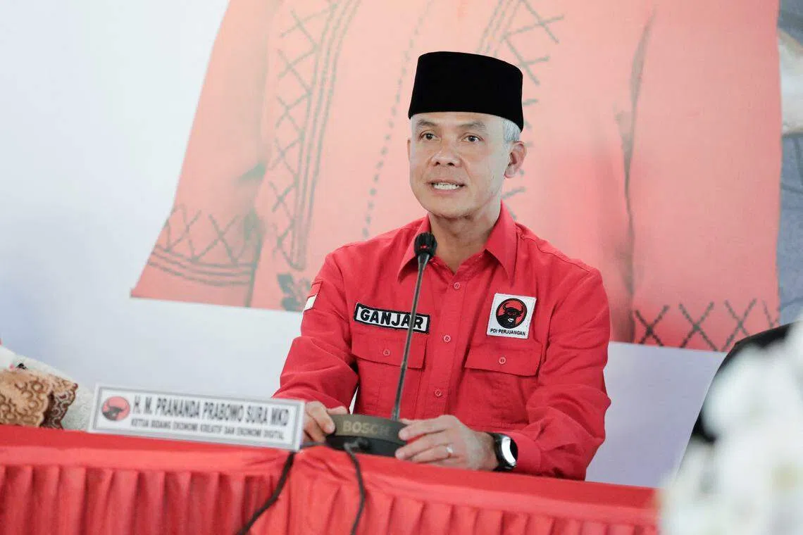 The survey showed 36.8 per cent of the 2,400 respondents backed the ruling party’s Ganjar Pranowo (top) while 34.7 per cent supported Prabowo Subianto, with 24.3 per cent in favour of Anies Baswedan.