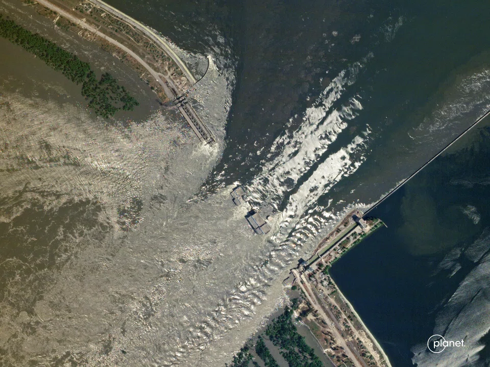 A satellite image shows the damaged Nova Kakhovka dam which the Ukrainians and Russians have accused each other attacking it.