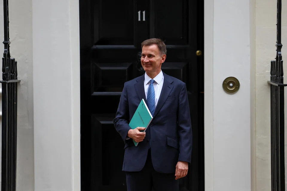 In two television interviews on Sunday, Hunt says his budget would be “prudent” and “responsible” and that he wants to “show a path” toward a lower-tax economy. 