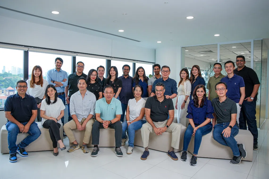The team at Vertex Ventures Southeast Asia and India led by managing partner Chua Joo Hock (standing, sixth from right). The Temasek-linked venture capital company was an early investor in tech unicorns such as Grab and fintech company Nium.