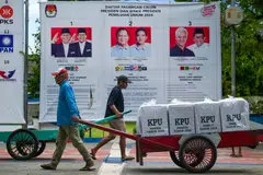 Officials unload ballot boxes in Jakarta, Indonesia, Feb 9, 2024. Nearly 259,000 candidates are contesting 20,600 posts across the archipelago of 17,000 islands in the world’s biggest single-day election.