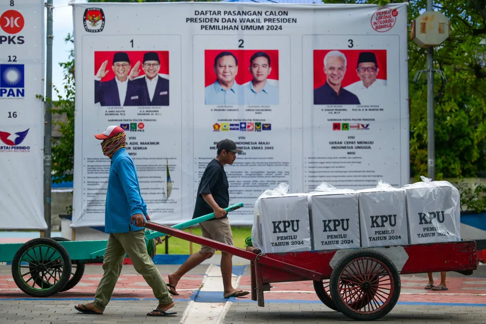 Officials unload ballot boxes in Jakarta, Indonesia, Feb 9, 2024. Nearly 259,000 candidates are contesting 20,600 posts across the archipelago of 17,000 islands in the world’s biggest single-day election.