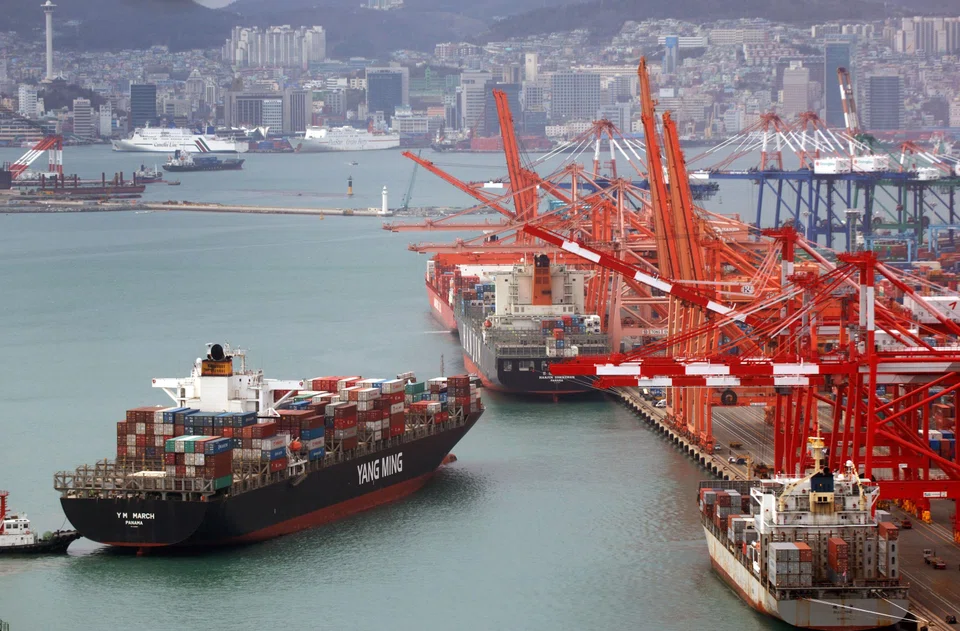 A Yang Ming Marine Transport Corp cargo ship arriving in Busan, South Korea.  The company did so well that it is awarding its workers up to 30 months salary on their next payday as a bonus. Shareholders approved the move. 