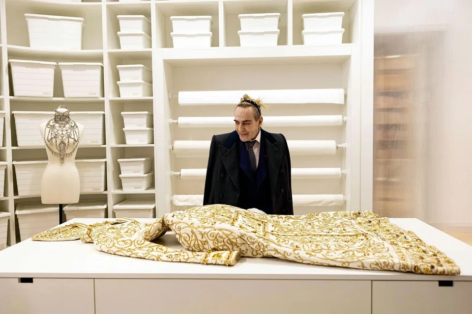 A new documentary about fashion designer John Galliano traces his career, cancellation and re-emergence.