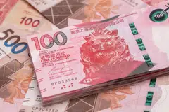 It remains profitable for the traders to borrow the Hong Kong dollar cheaply and buy the higher-yielding greenback, pocketing the rate difference. 