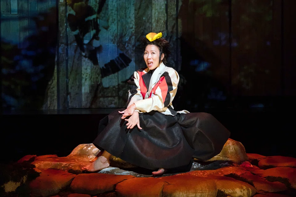 Koh Wan Ching plays a hornbill in Wild Rice's play about the climate crisis titled Pulau Ujong.