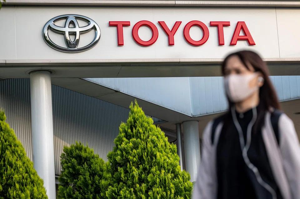 Toyota on Wednesday reported fourth-quarter profit slumped by a third, as a sliding yen and solid demand failed to offset the impact of production disruptions.