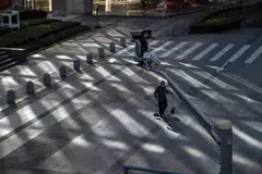 Even before the curbs were lifted, China’s economy was struggling, with a slump in consumer spending deepening and industrial output growing the slowest since the spring lockdowns. 