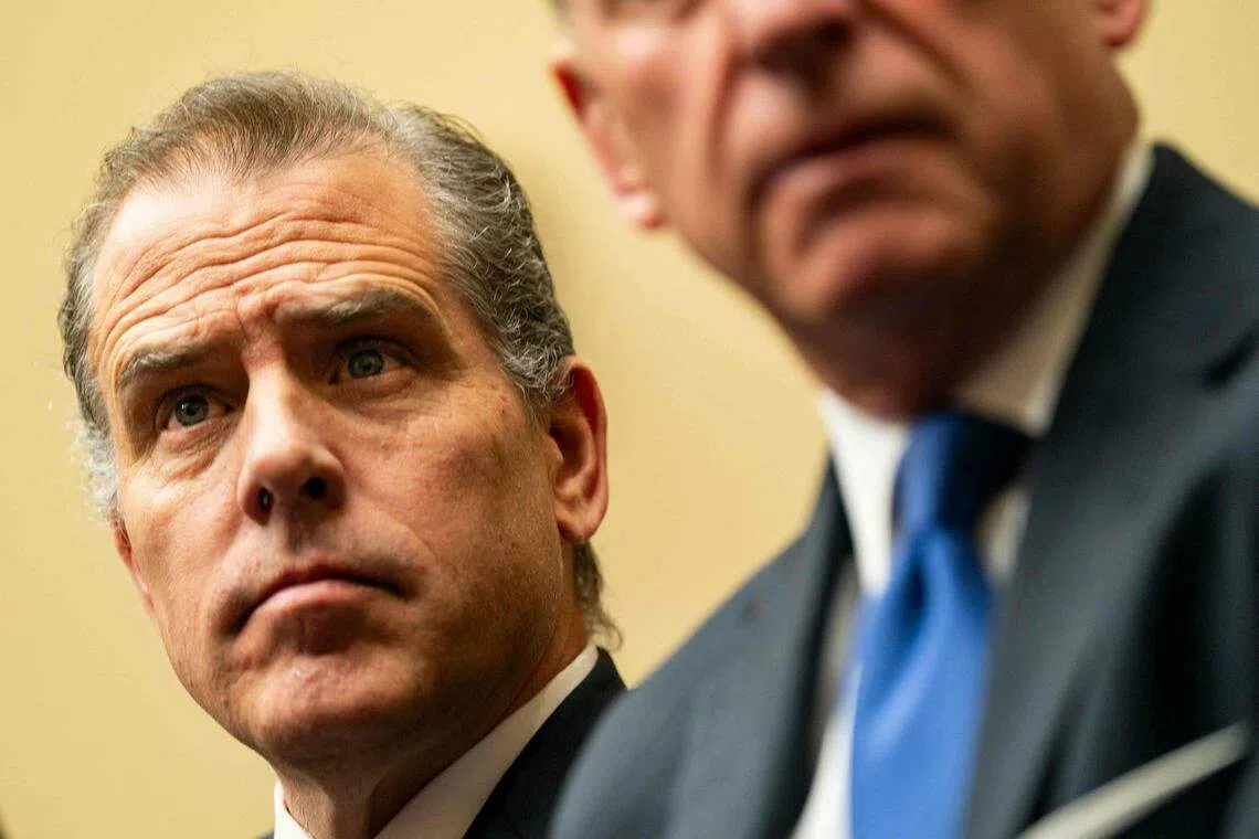 Hunter Biden (left) was arraigned on Thursday on nine counts of refusing to pay federal taxes.