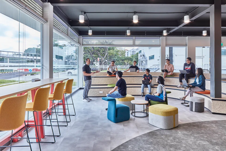 The new Decathlon Data Lab has floor-to-ceiling windows for natural lighting.