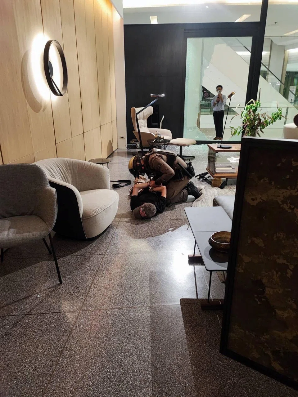 Two of the four were arrested in the Thai capital and two in the southern province of Yala on suspicion of selling a modified blank gun to the 14-year-old, who has been charged with premeditated murder and illegal possession of a firearm.