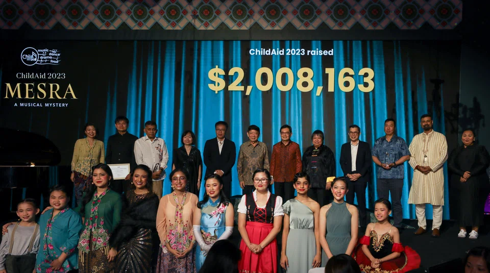 The performers who took part in ChildAid, with  guest of honour Deputy Prime Minister Heng Swee Keat (centre, in the back row, in red). 