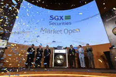 At the listing of Emperador on the Singapore Exchange on July 14 were, from left, George Schulze, Dalmore whisky expert for Asia at Emperador; Bryan Donaghey, chief executive of Whyte & Mackay and head of the whisky business at Emperador; Loh Boon Chye, SGX chief executive; Dr Andrew Tan, chairman of Emperador; Gerard Ho, Singapore’s Ambassador to the Philippines and Kevin Andrew Tan, director of Emperador. 