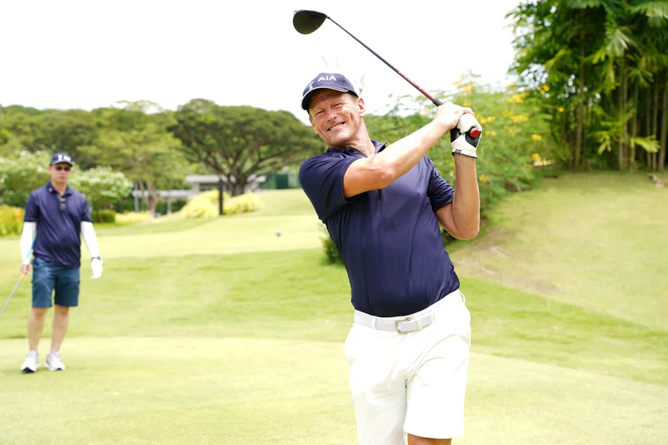 Former England and Tottenham Hotspur striker Teddy Sheringham in action at the AIA Better Lives Fund charity golf event at Tanah Merah Country Club. The tournament and a charity dinner raised more than S$370,000 for a good cause. 