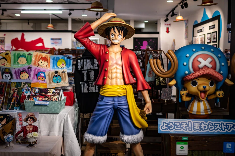 A statue of character Monkey D. Luffy, also known as Straw Hat, is displayed at the One Piece anime souvenir shop in Tokyo.