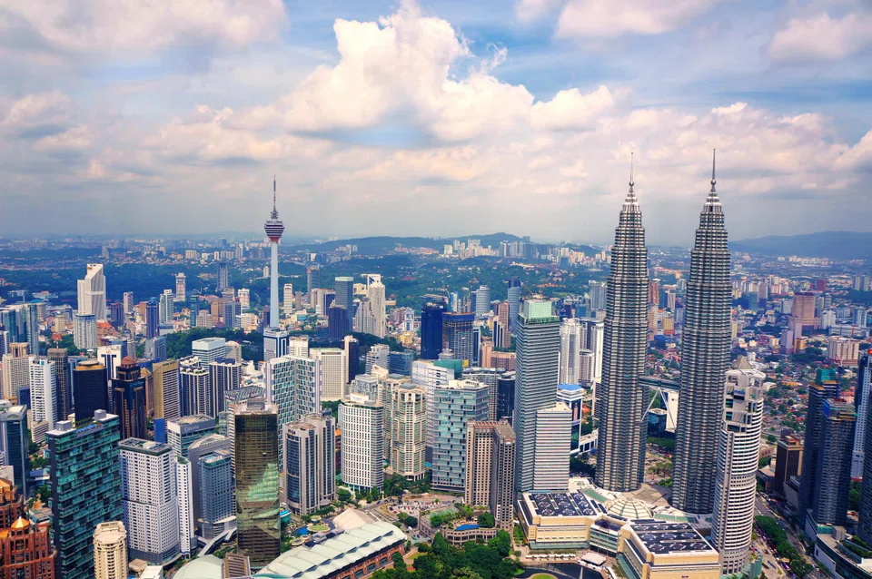 An aerial view of Kuala Lumpur, showing the Petronas Twin Towers at right. On the Malaysian bourse on Friday (Nov 4), 2.386 billion lots worth RM1.719 billion changed hands. 
