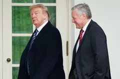 Former US President Donald Trump (left) said he hoped Mark Meadows (right) — his final White House chief of staff and a co-defendant in a sweeping racketeering indictment in Georgia stemming from efforts to thwart the 2020 election — was still “loyal” to him.