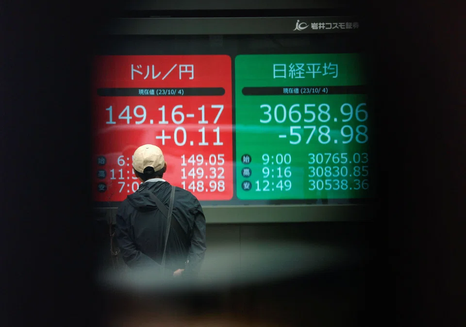 Stock markets in Asia, including Tokyo and Hong Kong , were down at mid day on Friday.