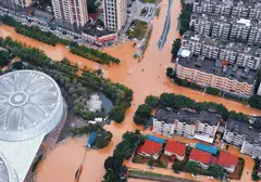 Four typhoons cause heavy losses, bringing flash flooding and hundreds of landslides in southern areas, while the north and northeast suffered record rain and evacuations.