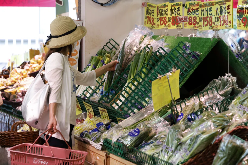 Japanese spending slipped 0.5 per cent in May from a year earlier, government data showed on Friday, dragged down by lower expenditure on vegetables as well as cars.